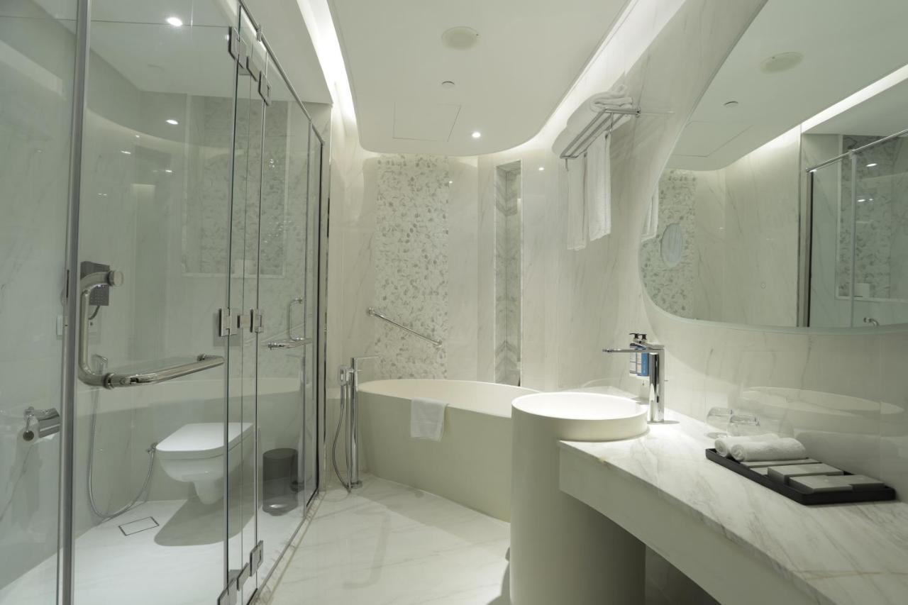 Century Marina Hotel - Lusail Exterior photo A modern bathroom