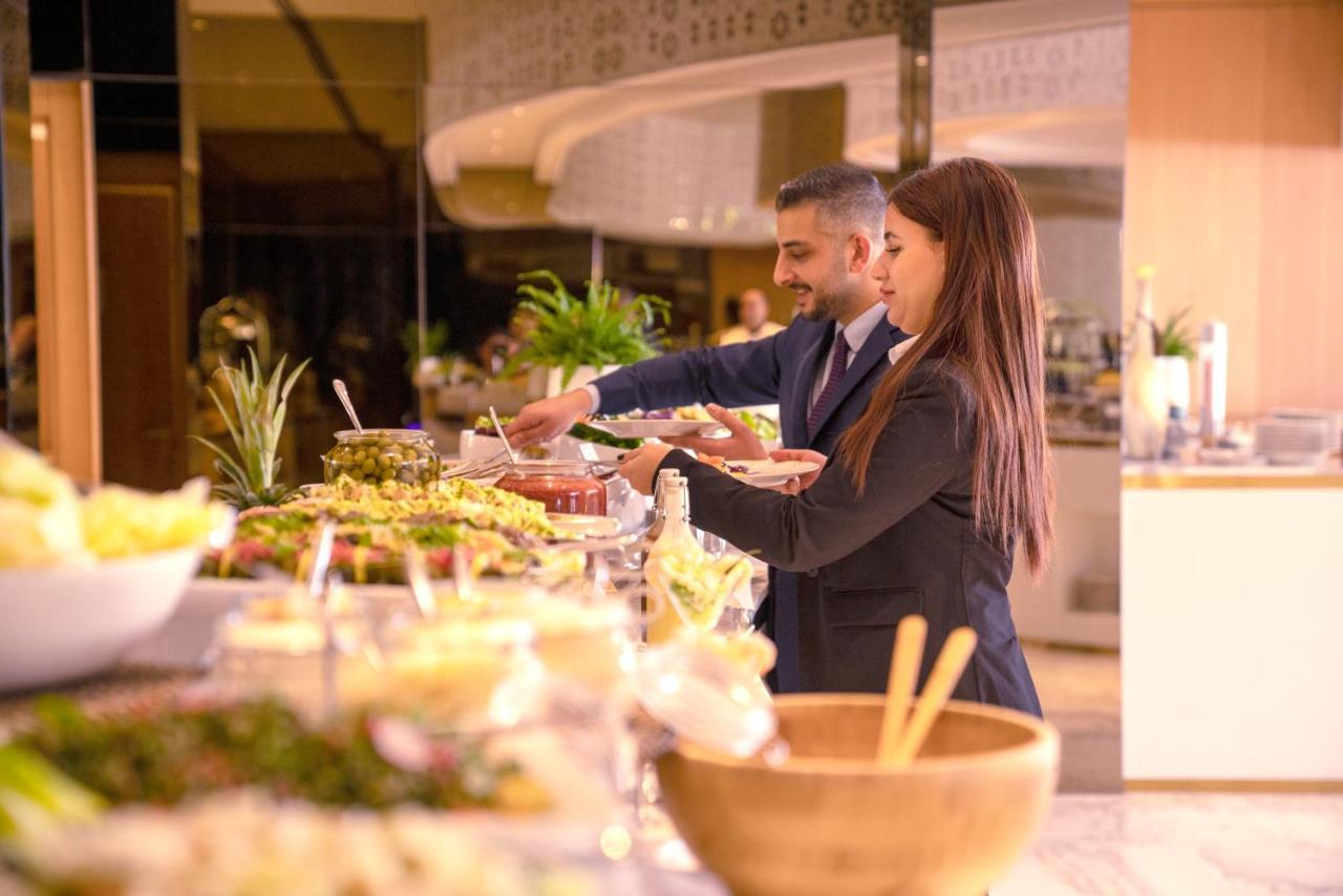 Century Marina Hotel - Lusail Exterior photo A buffet at a hotel